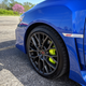 Obnoxious green calipers to complement the obnoxious wing. I hear Brownbos are still a thing, so... challenge accepted.